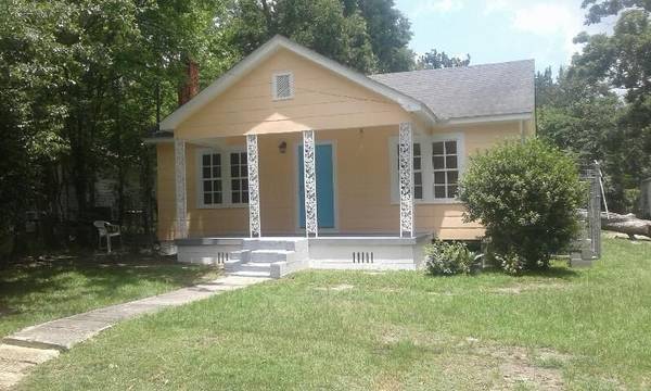 Double corner lot, with firepit and recreational storage.