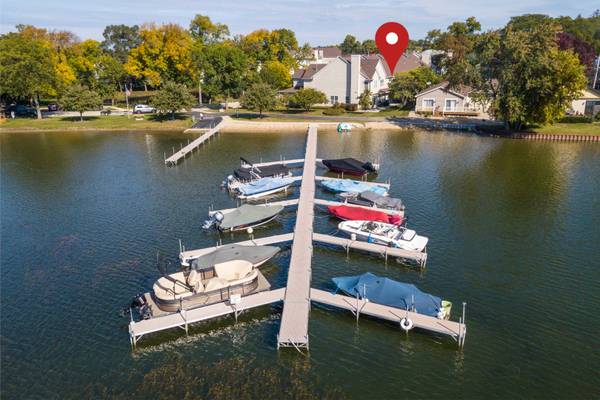 Rarely available T/home by the Lake! Updated. 2 car Garage!