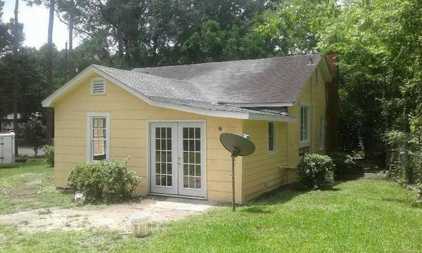 Double corner lot, with firepit and recreational storage.