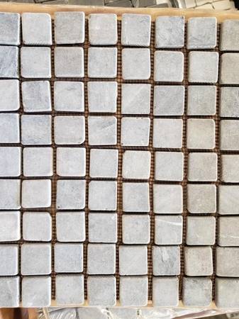 Mosaic Pebble Tile for showers, borders, and accents. Big selection.