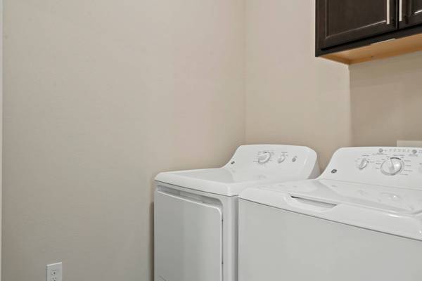 Courtyard View, Undermount Sinks, Subway Style Backsplash