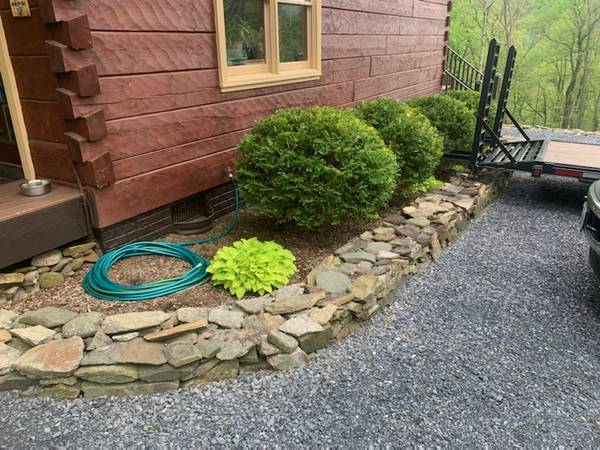 2 stacked stone / rock landscaping walls