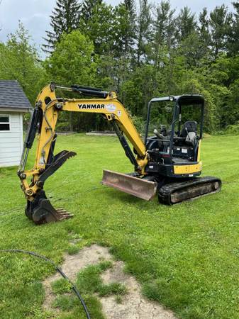 Excavator and Operator