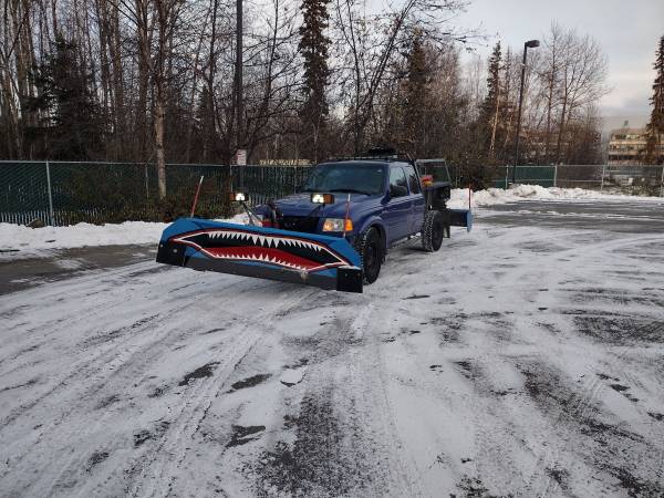 snow shark plowing