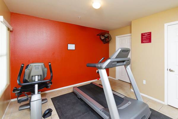 Elevator Access, Fitness Center, Fully Equipped Kitchenette