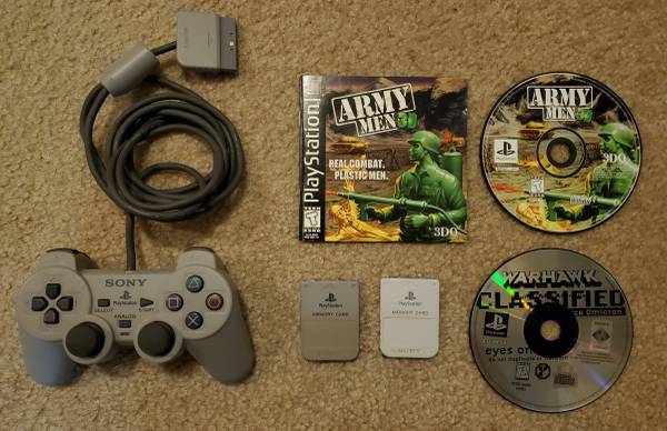 Playstation controller, 2 games, and 2 memory cards