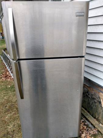 nice clean black and stainless refrigerator deliver