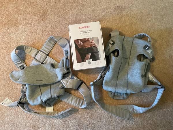 Two Baby bjorn baby carrier mini