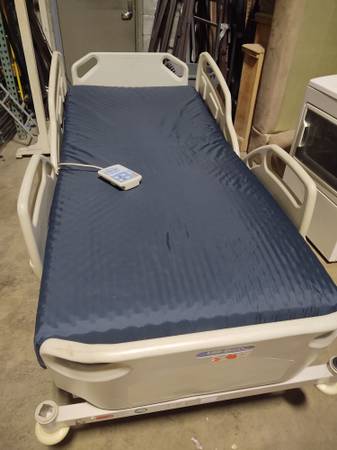 Like new Hillrom Versa Care hospital bed with mattress for sale!