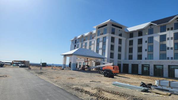 Roofing men standing seam