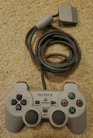 Playstation controller, 2 games, and 2 memory cards