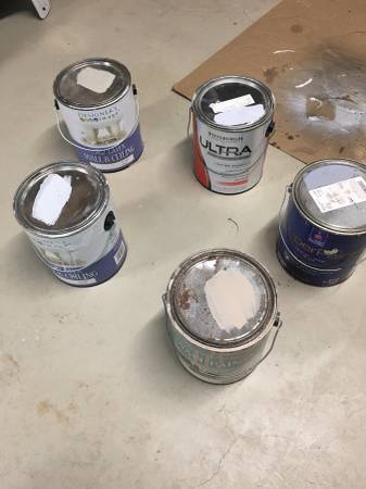 5 one gallon containers of paint