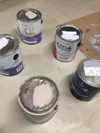 5 one gallon containers of paint