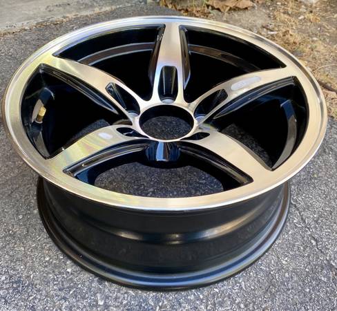 One 15×6 aluminum five spoke trailer wheel (5×4.5 bolt pattern)