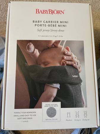 Two Baby bjorn baby carrier mini