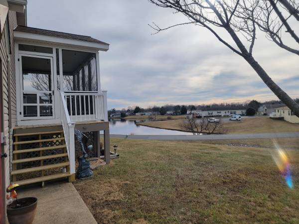 Move In Ready – 4 Bedroom/3 Bathroom Home! Overlooking The Lake!!