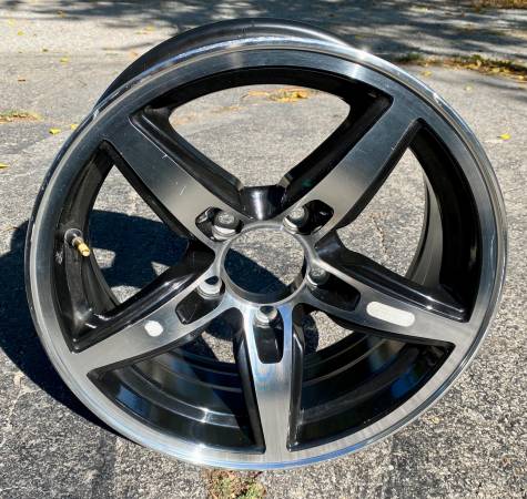 One 15×6 aluminum five spoke trailer wheel (5×4.5 bolt pattern)