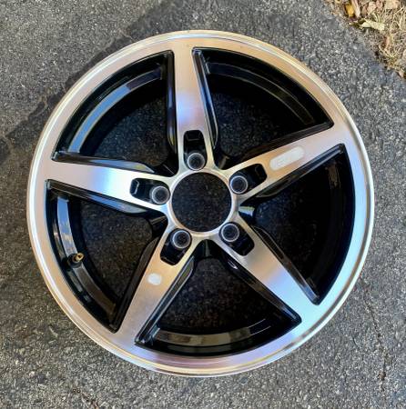 One 15×6 aluminum five spoke trailer wheel (5×4.5 bolt pattern)