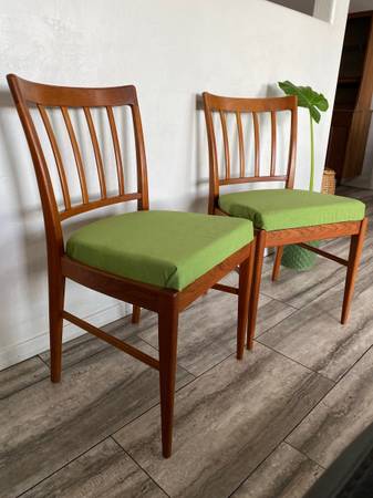 Danish modern solid sculpted back teak chair pair