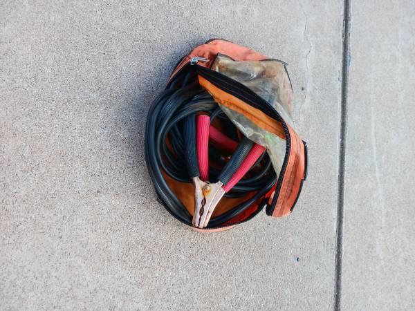 Set of automotive “jumper cables” in zipper case