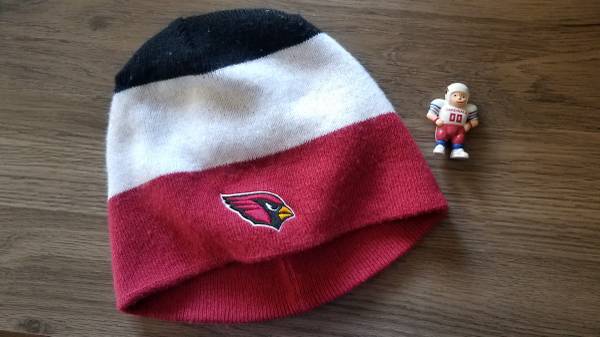 Arizona Cardinals swag: beanie, voodoo/frustration doll, action figure