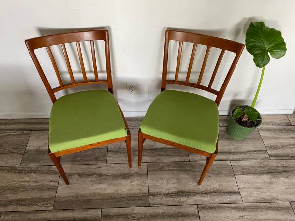 Danish modern solid sculpted back teak chair pair